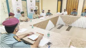  ?? Antonie Robertson / The National ?? Heavy traffic is expected in Sharjah’s Muwaileh, above; left, Maj Gen Mohammed Saif Al Zafeen, assistant chief of Dubai Police, centre in kandura, launches a roadsafety campaign