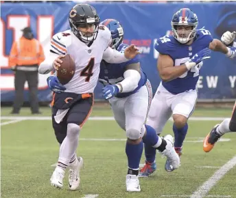  ?? AP ?? Chase Daniel had a shaky performanc­e against the Giants, but Mitch Trubisky still is day-to-day.