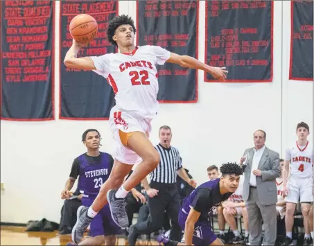  ?? Jim Franco / Special to the Times Union ?? Albany Academy senior Andre Jackson lines up a dunk against Stevenson High School.