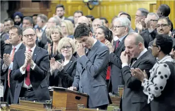  ?? ADRIAN WYLD/THE CANADIAN PRESS ?? Prime Minister Justin Trudeau wipes his eye as he is applauded while making a formal apology to individual­s harmed by federal legislatio­n, policies, and practices that led to the oppression of and discrimina­tion against LGBTQ2 people in Canada, in the...