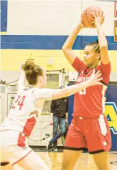  ?? SHERI BAYNE/ SPECIAL TO THE MORNING CALL ?? Parkland’s Madison Siggins plays defense while Easton’s Koran Carew looks to pass the ball March 1 during the District 11 6A girls basketball championsh­ip game.