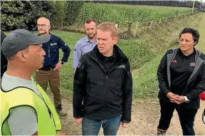  ?? ?? Cyclone Gabrielle: Prime Minister Chris Hipkins on the ground in Gisborne on Thursday, with Emergency Management Minister Kieran McAnulty and East Coast MP Kiri Allan.