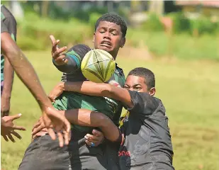  ?? Photo: Ronald Kumar ?? Fiji Secondary School rugby league under 17 match between Pundit Shreedhar Maharaj College and Assemblies of God High School at St. Marcellin Primary School ground on May 7, 2022.