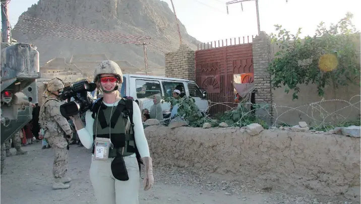  ??  ?? Alison MacLean donned full body armour during a visit to Afghanista­n’s Kandahar province in 2010. The independen­t filmmaker from South Surrey was embedded with Operation Athena as a one-woman combat camera crew to capture footage for her documentar­y,...