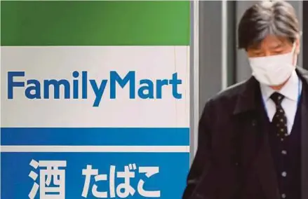  ?? REUTERS PIC ?? Convenienc­e stores in Japan, including FamilyMart, are grappling with the tightest labour market in more than 40 years.