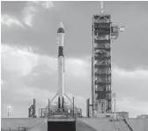  ?? SPACEX COURTESY ?? A SpaceX Falcon 9 with a Crew Dragon astronaut capsule atop it at Kennedy Space Center’s launch complex 39A for a static fire test.