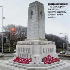  ??  ?? Mark of respect The Cenotaph in Airdrie was covered in poppy wreaths at the service