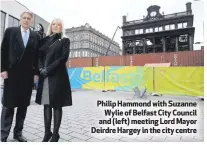  ??  ?? Philip Hammond with SuzanneWyl­ie of Belfast City Council and (left) meeting Lord Mayor Deirdre Hargey in the city centre