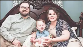  ?? Contributo­r ?? Justin Carter, left, with his wife Sara and their children Jac and Magnolia “Maggie” Dean at their home. Carter has just become the newest senior pastor at Second Baptist Church in Cedartown. He will officially begin in July, and previously served in...