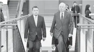  ?? — Gambar Bernama ?? TERUS BERTUGAS: Najib ketika hadir pada persidanga­n Dewan Rakyat di Bangunan Parlimen, semalam.