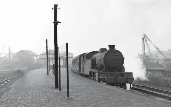  ?? W A C Smith/Transport Treasury ?? A glimpse of Dalry Road coaling facility on the far left locates the shed in relation to the island station of the same name as Gresley ‘V3’ class 2-6-2T No 67624 calls with the 1.10pm Leith (North) to Edinburgh (Princes Street) passenger service on 19 March 1960. On the east-to-north side of a useful triangle, being sited between Dalry Junction and Coltbridge Junction by the ‘Dalry Connecting Spur’, trains also passed through that were travelling via the 1876 spur to and from the E&G at Haymarket West. St Margarets-allocated for its entire career, 28 November 1931 to 21 September 1960, its pre-October 1952 guise being as a ‘V1’, this Doncaster-built engine would ultimately be credited with 730,334 miles of service.