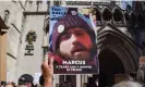  ?? Vuk Valcic/Sopa Images/Shuttersto­ck ?? A protester holds a picture of Marcus Decker during a demonstrat­ion in July. Photograph: