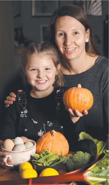  ?? Picture: MIKE DUGDALE ?? HEALTHY START: Kim McCallum and daughter Poppie, 8, took part in the Barwon Infant Study, which revealed the importance of a plant-based diet during pregnancy.