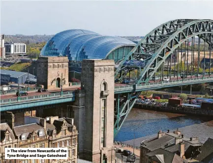  ?? ?? > The view from Newcastle of the Tyne Bridge and Sage Gateshead