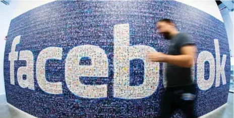  ?? JONATHAN NACKSTRAND/AFP/GETTY IMAGES ?? As the company faces massive backlash, Facebook is taking steps to combat criticism and help the community.