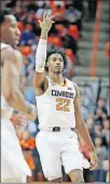  ?? TERRY/ THE OKLAHOMAN] ?? Oklahoma State's Kalib Boone gestures after making a jump shot in the Cowboys' 76-64 loss to Texas on Wednesday. [BRYAN
