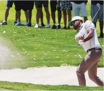 ?? MOISES CASTILLO/ASSOCIATED PRESS ?? Tony Finau hits out of a bunker at the sixth hole on Saturday at the Mexico Open in Vallarta, Mexico. He takes a two-stroke lead to the final round. Finau was second in this tournament last year.