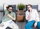  ?? ISAK TINER/THE NEW YORK TIMES ?? Lawrence Schlossman, right, and James Harris, hosts of the podcast “Throwing Fits,” are pictured June 23 in New York.