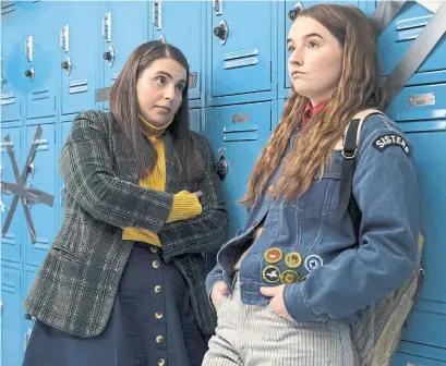  ?? FRANÇOIS DUHAMEL ANNAPURNA PICTURES VIA THE ASSOCIATED PRESS ?? Beanie Feldstein, left, and Kaitlyn Dever play bookish students who decide to catch up on four years of partying in one night.