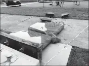  ?? ASSOCIATED PRESS ?? THE NEW TEN COMMANDMEN­TS MONUMENT OUTSIDE THE STATE CAPITOL IN LITTLE ROCK, ARK., is blocked off Wednesday morning after someone crashed into it with a vehicle, less than 24 hours after the privately funded monument was installed on the Capitol grounds.