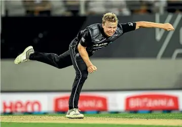  ?? PHOTOSPORT ?? A banner saying ‘‘No means no’’ (below), directed at Black Cap Scott Kuggeleijn, above, was asked to be removed during Wednesday’s Twenty20 internatio­nal between New Zealand and India at Westpac Stadium in Wellington.