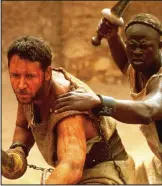  ??  ?? Slaves of the arena: Maximus and Juba in Gladiator. But many volunteere­d to fight