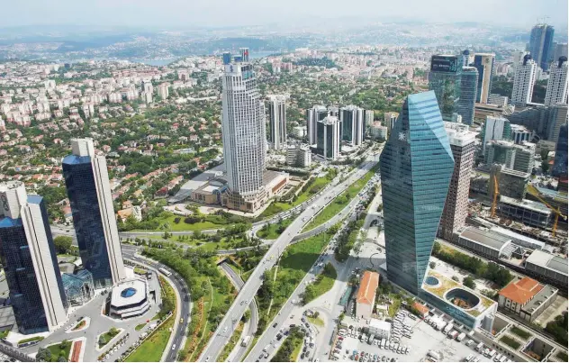  ?? Reuters ?? ↑ Business and the financial district of Levent seen from the Sapphire Tower in Istanbul, Turkey.