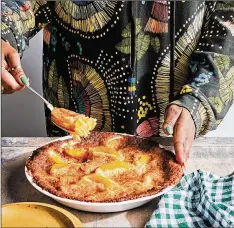  ?? COURTESY OF MATT ARMENDARIZ ?? A baker friend helped actress and vegan food star Tabitha Brown convert a dessert favorite into this recipe for Lazy Peach Cobbler to fit her plant-based diet. From Brown’s “Cooking from the Spirit.”