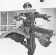  ?? ANDREW FRANCIS WALLACE/TORONTO STAR FILE PHOTO ?? One of the most spectacula­r costumes in The Nutcracker is the coat worn by Uncle Nikolai in the opening party scene. It’s so heavy that it risks throwing its occupant off balance as he executes a series of fast pirouettes.