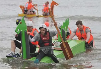  ??  ?? Sharon Callan, Declan Price, Richard English and Daithí McGrane, members of the Van Dijk Architects team at the Raft Race held in Blackrock.