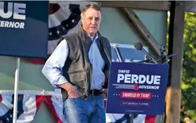  ?? AP PHOTO/JOHN BAZEMORE ?? Republican candidate for Georgia Governor former Sen. David Perdue speaks at a rally to oppose a proposed Rivian electric vehicle assembly plant on March 1 in Rutledge, Ga.