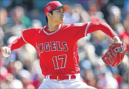  ?? AP PHOTO ?? In this Feb. 24 file photo, Los Angeles Angels’ Shohei Ohtani works against the Milwaukee Brewers during the first inning of a spring training baseball game in Tempe, Ariz.