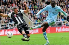  ??  ?? Toure de force: Yaya scores one of his two goals in a crucial win at Newcastle in 2012 Thank you. Now,” and he taps his chest, “leave it to me”.’ ‘I was like, “What’s he on about?” Oh, Yaya being himself again”. So, I just go and do my thing. ‘Next thing you know, we play this game, win 2-0, and Yaya scores two. Big players, big moments kind of thing. ‘Then, we prepare for the QPR game, and Kun [Sergio Aguero] does the same thing. He comes to me and says, “Vinnie, today, leave it to me”. You know, they’d never done this before, they’ve never done since. Only these two games. I’ll remember it forever.’