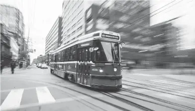  ?? ERNEST DOROSZUK / POSTMEDIA NEWS ?? Toronto’s electric-powered streetcar network will benefit from the city’s recently issued first green bond.