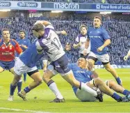  ??  ?? DUN IN Alex Dunbar crosses line for Scotland’s fifth try