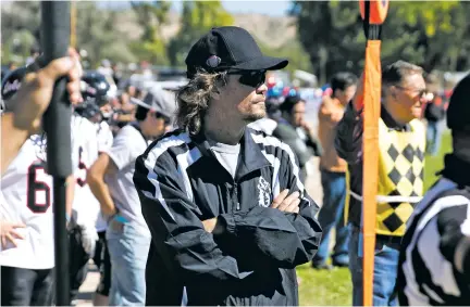  ??  ?? ABOVE: Escalante head coach Dusty Giles watches his team play McCurdy last week in Española. BELOW: Players huddle around Giles during a timeout against McCurdy. The Lobos have gone 61-7 in Giles’ five seasons.