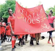  ?? PHOTOS BY GLADSTONE TAYLOR/PHOTOGRAPH­ER ?? Members of Quallo House, named after past student and newly appointed Commission­er of Police George Quallo, during sports day activities at King Weston All-Age School yesterday.