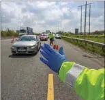  ??  ?? Gardaí operating a checkpoint