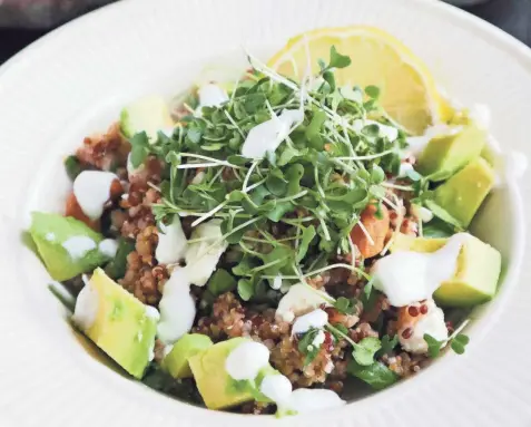  ?? GRETCHEN MCKAY/POST-GAZETTE ?? Garnished with avocado and broccoli microgreen­s, this “ancient” grain bowl is a snap to compose and makes a nutritious breakfast, lunch or dinner.
