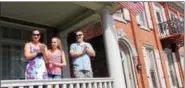  ??  ?? The Mace family cheers during the Kutztown University 150th Anniversar­y Parade on Sept. 10.