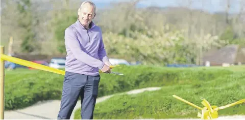  ?? ?? Tim Allen, Cowdray's Director of Golf, declares the course open after an extensive redesign project