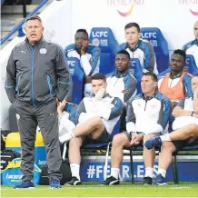  ?? MICHAEL REGAN/GETTY IMAGES ?? Leicester manager Craig Shakespear­e, left, has led a team that went from escaping relegation in 2014-15 to reaching the Champions League quarterfin­als.