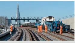  ?? PAUL STEPHEN. ?? Balfour Beatty’s New Track Constructi­on machine lays track on Bermondsey dive-under’s western ramp on November 28. It will need top-stoning and tampering before it is ready to commission throughout 2017.