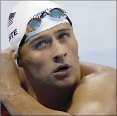  ?? AP PHOTO/MICHAEL SOHN ?? In this Aug. 9, 2016, file photo, United States’ Ryan Lochte checks his time in a men’s 4x200-meter freestyle heat at the 2016 Summer Olympics, in Rio de Janeiro, Brazil.