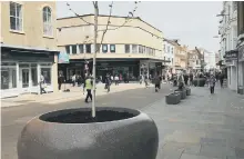  ??  ?? Giant planters now have their trees, as part of scheme