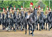  ?? ?? The Household Cavalry put mounts through their paces during rehearsals on Horse Guards Parade last week, but many participan­ts in the Queen’s birthday parade have learnt the skill in a matter of months