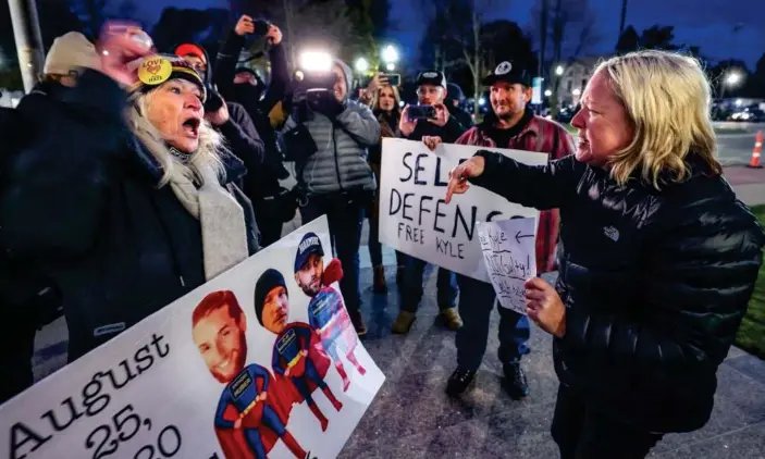  ?? Photograph: Evelyn Hockstein/Reuters ?? Demonstrat­ors for and against Kyle Rittenhous­e shout at each other outside the Kenosha county courthouse in Kenosha, Wisconsin, on Monday.