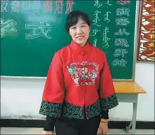  ?? PROVIDED TO CHINA DAILY ?? Yan Wenyun in the classroom for her Manchu language course in Harbin, Heilongjia­ng province.