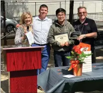  ?? FILE PHOTO ?? Los Gatos High School principal Kevin Buchanan, right, has announced his plans to retire at the end of the school year. He's seen in this file photo with Joanne Rodgers, left, LGHS Home and School President Shawn Mortensen and Los Gatos High School band director Ken Nakamoto.