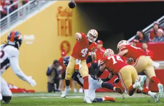  ?? Michael Zagaris / Getty Images ?? Undrafted quarterbac­k Nick Mullens has never been big enough or strong enough to impress, but his numbers through five starts have pushed him closer to the top with the 49ers.